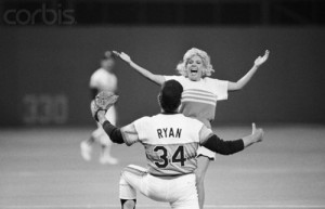 Nolan Ryan About To Hug Woman On Field